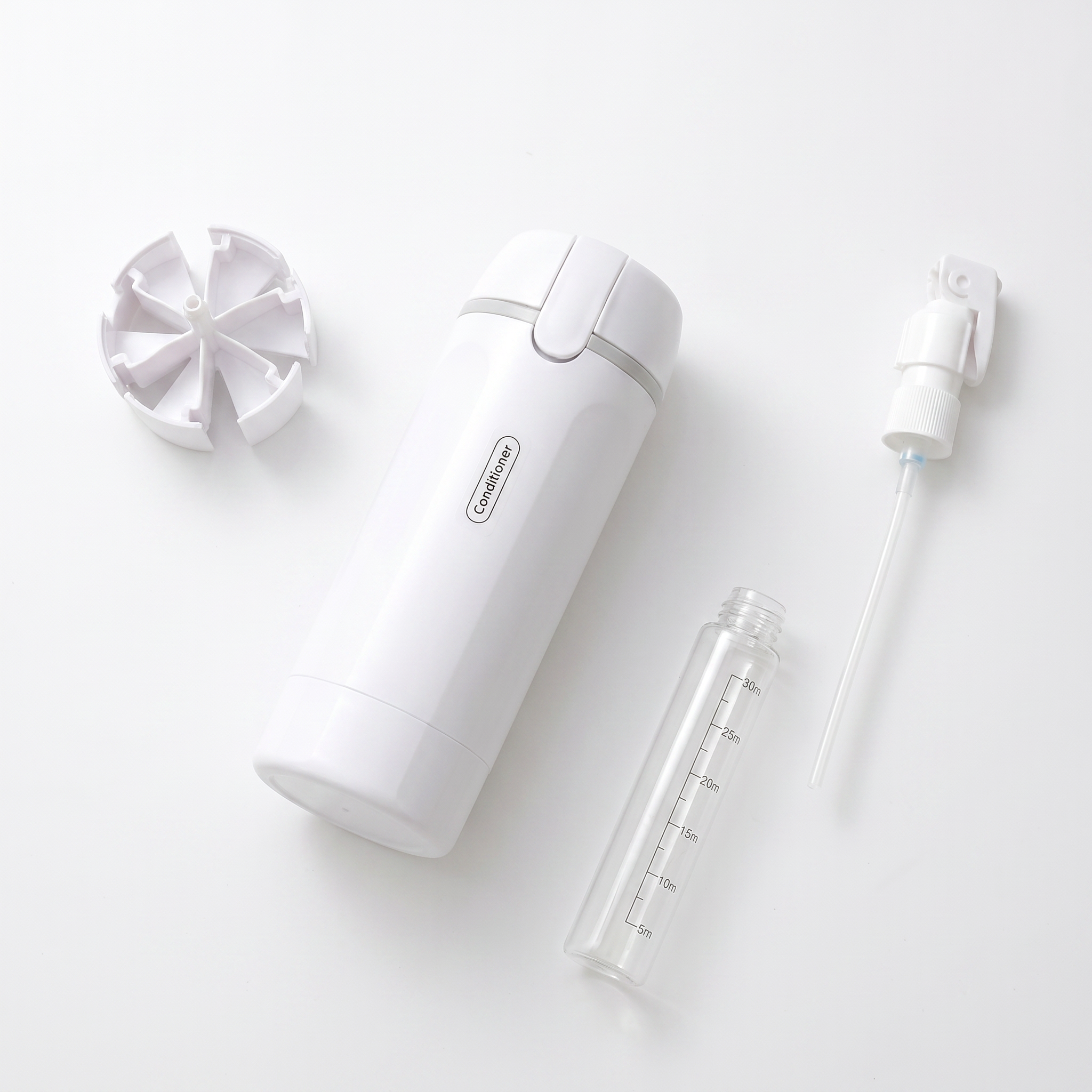 GoSqueezee contents – bottle, refill tube, spray nozzle and diffuser